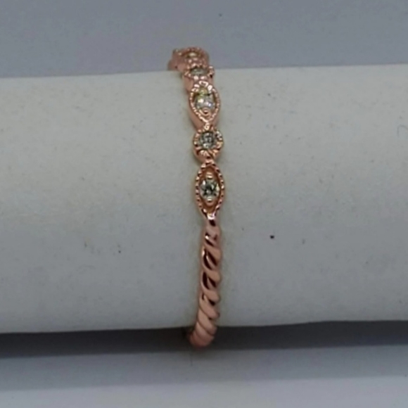 14K ROSE TWISTED RING WITH 7 DIAMONDS AND ENGAGEMENT MILIGREEN DESIGN